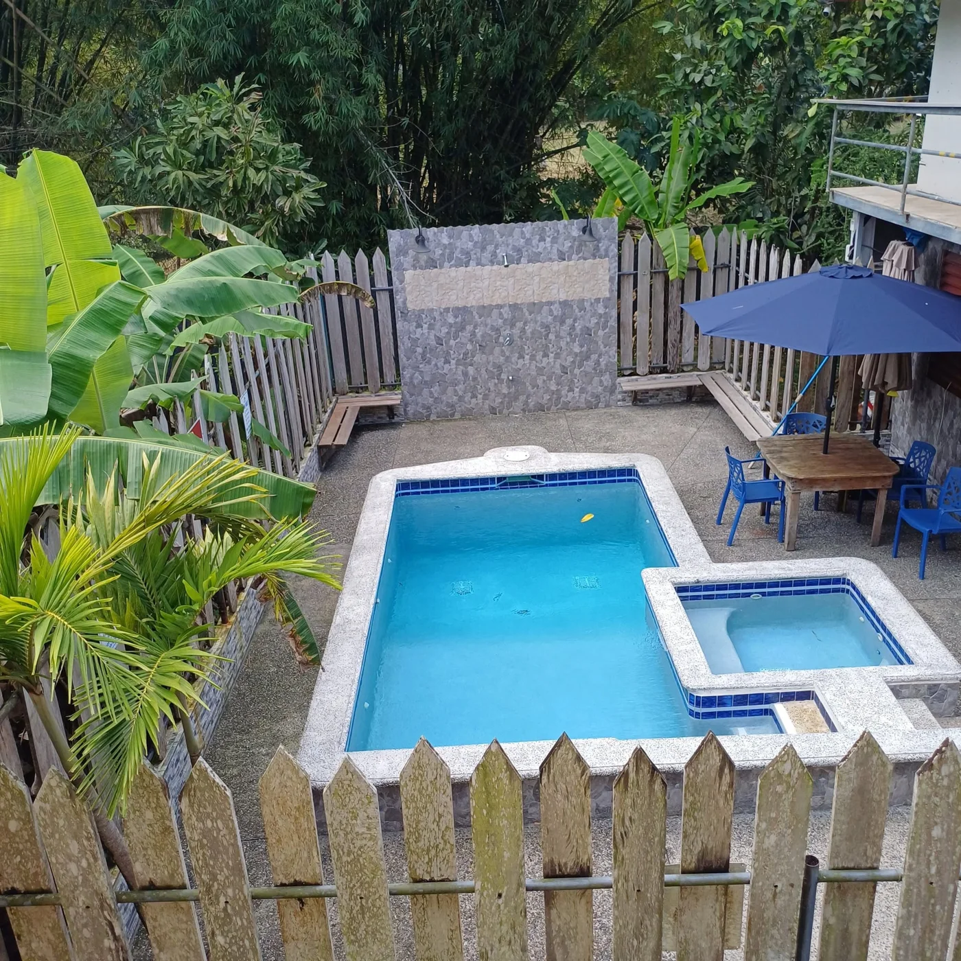 North Stay swimming pool and adjoining small pool with tropical greenery